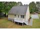 Back exterior view featuring a deck and outdoor space, great for entertaining and relaxation at 2708 Sundial Cir, Durham, NC 27704