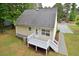 Exterior rear view featuring a small deck and backyard, perfect for outdoor relaxation at 2708 Sundial Cir, Durham, NC 27704