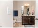 View of guest bathroom with a single sink vanity and toilet at 2802 Bingham Dr, Mebane, NC 27302
