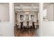Dining room with dark wood table, upholstered chairs, and coffered ceiling at 2802 Bingham Dr, Mebane, NC 27302