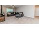 The living room has a large sectional couch and a media center at 2802 Bingham Dr, Mebane, NC 27302