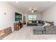 The living room has a large sectional couch and a media center at 2802 Bingham Dr, Mebane, NC 27302