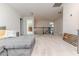 Open loft area with neutral carpeting, wrought iron railing, and ample natural light at 2802 Bingham Dr, Mebane, NC 27302