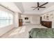 The spacious bedroom features a king bed, windows, and stylish decor at 2802 Bingham Dr, Mebane, NC 27302