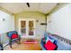 Inviting screened-in porch featuring comfortable seating and an outdoor ceiling fan at 2802 Bingham Dr, Mebane, NC 27302