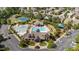 Aerial view of a community clubhouse with pool, tennis courts and recreation area at 2821 Corbett Grove Dr, Raleigh, NC 27604