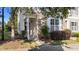 Inviting townhome entrance showcasing stone detail, warm siding, and a cozy covered entryway at 2821 Corbett Grove Dr, Raleigh, NC 27604