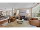 Open living room with modern furniture and beautiful decor, with dining area connected to the kitchen at 2821 Corbett Grove Dr, Raleigh, NC 27604