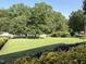 Picture of a well-manicured front lawn with garden and shrubbery at 2909 Sprucewood Dr, Durham, NC 27707