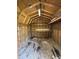 Interior view of a shed, featuring a workbench shelf with fluorescent tube lighting at 2909 Sprucewood Dr, Durham, NC 27707