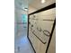 Shower with tile surround and glass doors at 2909 Sprucewood Dr, Durham, NC 27707