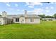 Backyard with lush green grass and a patio at 3027 Maple # T1, Burlington, NC 27215