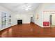 Bright living space with wood flooring, fireplace, french doors, and lots of open space at 3027 Maple # T1, Burlington, NC 27215