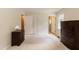 Bright and spacious bedroom with two windows at 303 Spring St, Louisburg, NC 27549