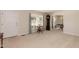 Traditional living room featuring a front door, large window, and classic furnishings at 303 Spring St, Louisburg, NC 27549