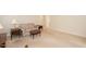 Large living room featuring a floral sofa and traditional wood furniture at 303 Spring St, Louisburg, NC 27549