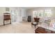 Bright living room featuring custom built-ins and a cozy sitting area at 303 Spring St, Louisburg, NC 27549