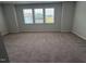 Spacious bedroom features plush carpeting and a window view, creating a cozy and inviting atmosphere at 3191 Mission Olive Pl # 350, New Hill, NC 27562