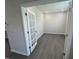 Office space showcases hardwood floors and a French door entry, ideal for a professional workspace at 3191 Mission Olive Pl # 350, New Hill, NC 27562