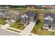 Overview of a modern home situated in a community with well-kept lawns and convenient access to local facilities at 3500 Bailey Lake Dr, Fuquay Varina, NC 27526