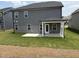 Exterior of home featuring a covered porch and a well-maintained lawn at 3500 Bailey Lake Dr, Fuquay Varina, NC 27526
