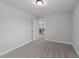Comfortable bedroom featuring soft carpet and open doorway into the hallway at 3500 Bailey Lake Dr, Fuquay Varina, NC 27526