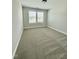 Cozy bedroom with carpeted floor, window, and ample natural light at 3500 Bailey Lake Dr, Fuquay Varina, NC 27526