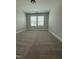 Bright bedroom with natural light, soft carpeting, and freshly painted neutral walls at 3500 Bailey Lake Dr, Fuquay Varina, NC 27526
