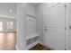 Inviting entryway with storage bench and coat hooks, providing style and organization at 3500 Bailey Lake Dr, Fuquay Varina, NC 27526
