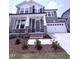 Charming two-story house features a modern exterior, well-kept landscaping, and a spacious two-car garage at 3500 Bailey Lake Dr, Fuquay Varina, NC 27526
