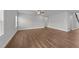 Open concept living room features hardwood floors and ample natural light at 3500 Bailey Lake Dr, Fuquay Varina, NC 27526