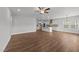 Open concept living space connects to the kitchen with hardwood floors at 3500 Bailey Lake Dr, Fuquay Varina, NC 27526