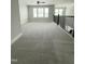 Large loft featuring carpeted floors, lots of natural light, and a ceiling fan at 3500 Bailey Lake Dr, Fuquay Varina, NC 27526