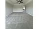 Expansive main bedroom featuring tray ceilings and large windows offering abundant natural light at 3500 Bailey Lake Dr, Fuquay Varina, NC 27526