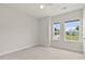 Bright bedroom with dual windows and neutral carpeting at 359 Abbot Pl, Chapel Hill, NC 27516