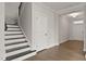 Inviting hallway with staircase and hardwood floors at 359 Abbot Pl, Chapel Hill, NC 27516
