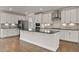Modern kitchen featuring stainless steel appliances, sleek countertops, and a functional island at 359 Abbot Pl, Chapel Hill, NC 27516