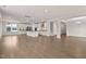 Expansive living space with a modern kitchen, open floor plan, and hardwood flooring throughout at 359 Abbot Pl, Chapel Hill, NC 27516
