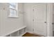 Functional mudroom with built-in bench seating, cubbies, and convenient access to the entryway at 359 Abbot Pl, Chapel Hill, NC 27516