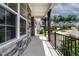 Inviting front porch with stone accents and a charming black railing at 359 Abbot Pl, Chapel Hill, NC 27516