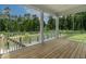 Screened-in porch with wood flooring and views of the landscaped backyard at 359 Abbot Pl, Chapel Hill, NC 27516
