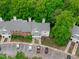 Aerial view showcasing the building, parking and surrounding lush greenery enhancing its appeal at 405 Gooseneck Dr # B6, Cary, NC 27513