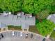 Aerial view showcasing the building, parking and surrounding lush greenery enhancing its appeal at 405 Gooseneck Dr # B6, Cary, NC 27513