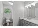 The bathroom features a single vanity, a toilet and a shower-tub combo at 405 Gooseneck Dr # B6, Cary, NC 27513