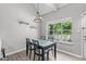 This modern dining room is bright and airy with views through the large window at 405 Gooseneck Dr # B6, Cary, NC 27513