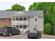 Condo exterior featuring covered second story porch and two car parking at 405 Gooseneck Dr # B6, Cary, NC 27513