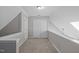 Hallway with a closet and a neutral colored carpet at 405 Gooseneck Dr # B6, Cary, NC 27513