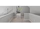 Hallway with an exercise bike room and a neutral colored carpet at 405 Gooseneck Dr # B6, Cary, NC 27513