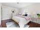 Bright bedroom with hardwood floors, and natural light at 407A Edward St, Durham, NC 27701