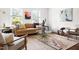 Bright living room featuring natural light, hardwood floors, and comfortable seating at 407A Edward St, Durham, NC 27701